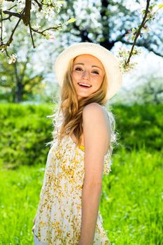 beautiful young girl happy in summer outdoor