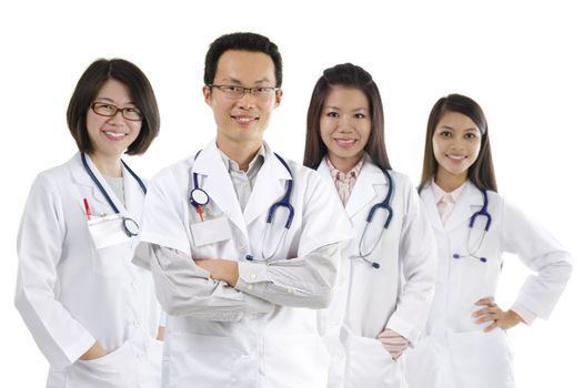 Asian medical team standing on white background