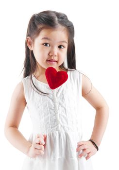 Asian little girl holding a love shape isolated on white background