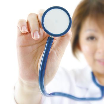 Stethoscope in a Asian female doctor hand