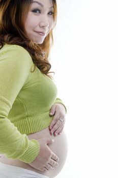 Asian pregnant lady standing on white background