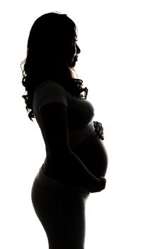 Silhouette of a pregnant woman on white background