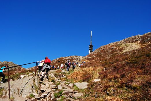 people going towards the top tower at Ulriken in Bergen Norway