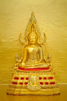Image buddha in the gold wall background