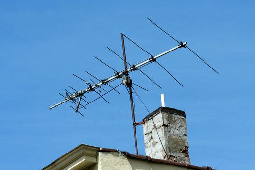 TV antenna on the roof of a building