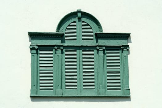 Old window with shutters