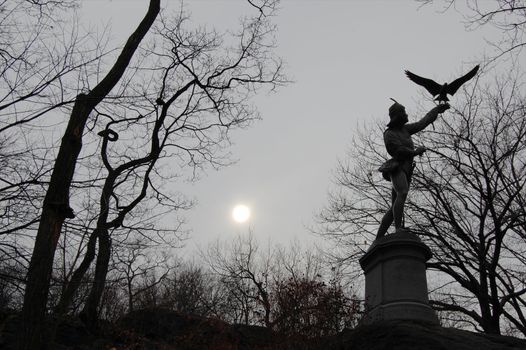 The Falconer statue in Central Park is seen here on an exceptionally grey late winter's day.
