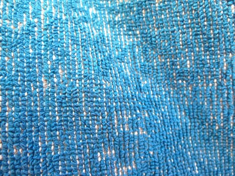 section of some blue fabric as a background