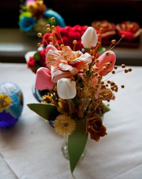 plastic flowers on a flowerpot