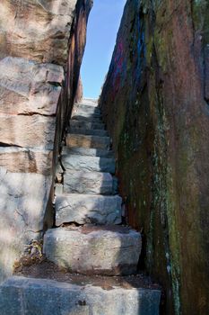 Rock stairs leading to a cliff