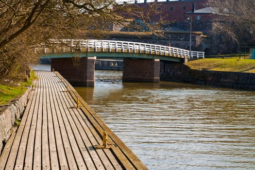 small boat dock and a walking bridge