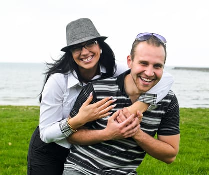 Portrait of a smiling couple by the sea