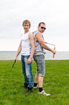 Fight club: Two fighters standing back to back