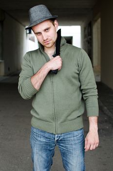 Portrait of a street bandit with knife in hand.