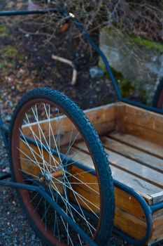 Old wooden wheelbarrow with rubber tires