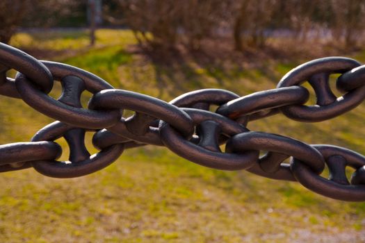 Two black chains crossing