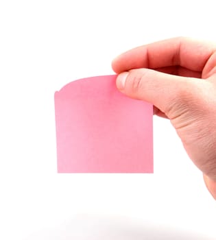 Hand and note paper isolated on white background.