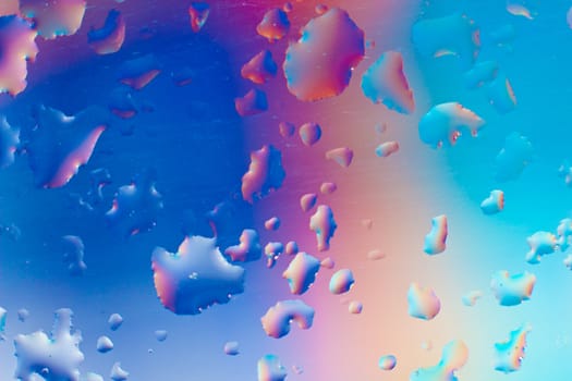 A picture of abstract colors with water in front.