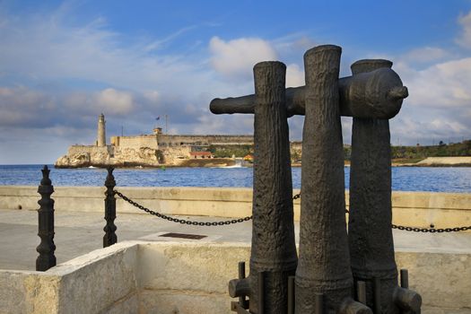 A view old cannon pointing towards El Morro fortress in Havana bay entrance 