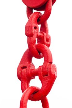 Close up shot of big painted red chain links isolated on white background