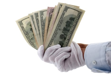 hand in white gloves holding dollars