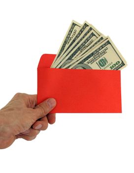 hand holding red envelope with money over white