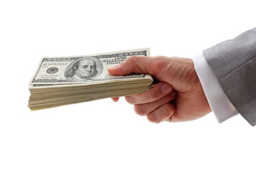 hand of businessman holding pile of dollars