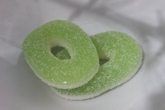 nice image of two gummy sweets on white