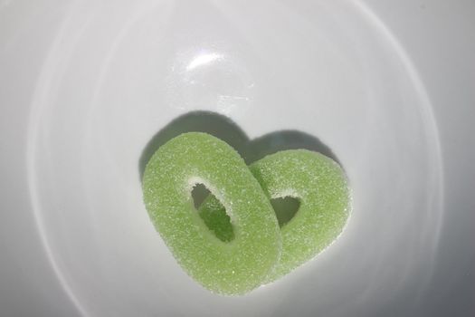 nice image of green sugar candy on white 