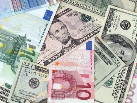 cash background: euros and dollars