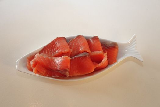 slices of fresh salmon, red fish on a plate