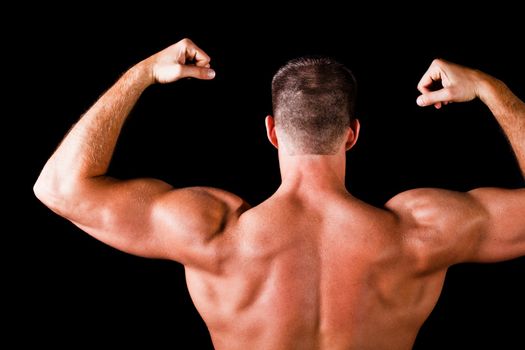 Muscular man isolated on black background