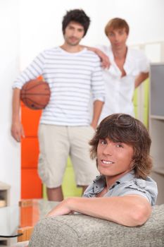 Guys waiting to play basketball