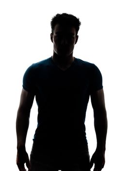 Male figure in silhouette looking at the camera isolated on white background