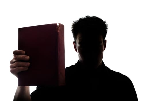 Man figure in silhouette showing a book isolated on white background