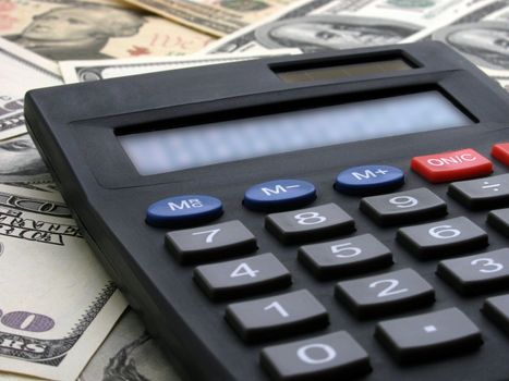 calculating income: calculator on money