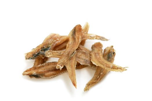 few dried fish on white background