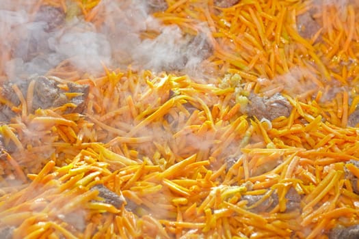 meat and carrots for pilaf close up