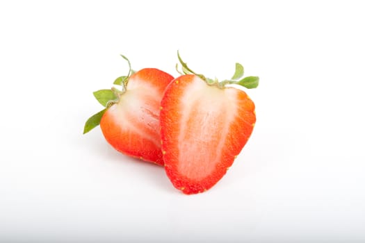 two half strawberrys isolated on white background