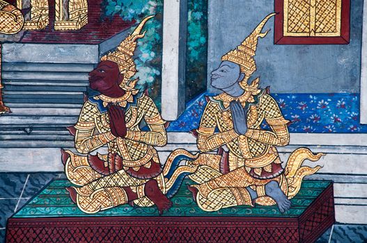 Thai Mural Painting on the wall, Wat Phra Kaew, Bangkok, Thailand (Ramayana story). The temple is created with money donated by people it is public domain and open to the public Visits.