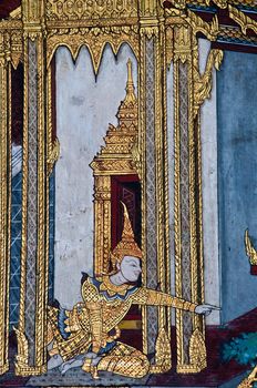 Thai Mural Painting on the wall, Wat Phra Kaew, Bangkok, Thailand (Ramayana story). The temple is created with money donated by people it is public domain and open to the public Visits.