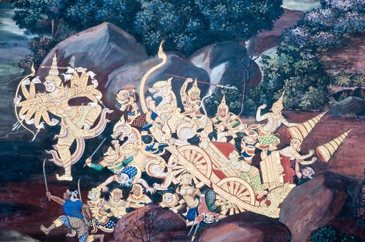 Thai Mural Painting on the wall, Wat Phra Kaew, Bangkok, Thailand (Ramayana story). The temple is created with money donated by people it is public domain and open to the public Visits.