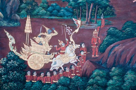 Thai Mural Painting on the wall, Wat Phra Kaew, Bangkok, Thailand (Ramayana story). The temple is created with money donated by people it is public domain and open to the public Visits.