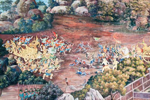 Thai Mural Painting on the wall, Wat Phra Kaew, Bangkok, Thailand (Ramayana story). The temple is created with money donated by people it is public domain and open to the public Visits.