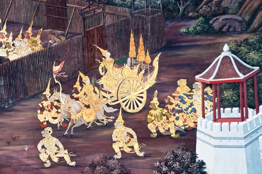 Thai Mural Painting on the wall, Wat Phra Kaew, Bangkok, Thailand (Ramayana story). The temple is created with money donated by people it is public domain and open to the public Visits.