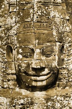 Enigmatic  face in Bayon temple in Angkor Wat Cambodia