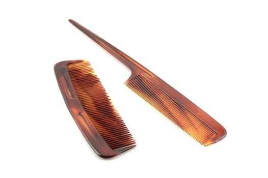 Two combs over white