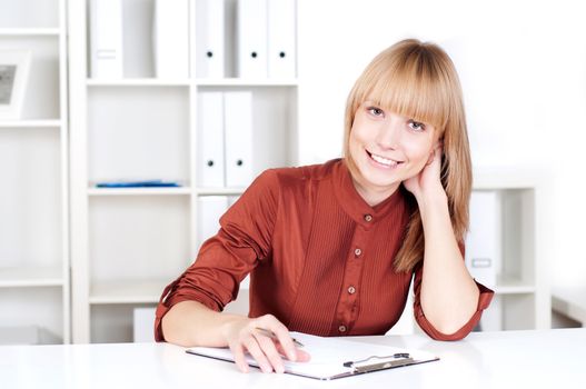 portrait of a beautiful woman who works in the office