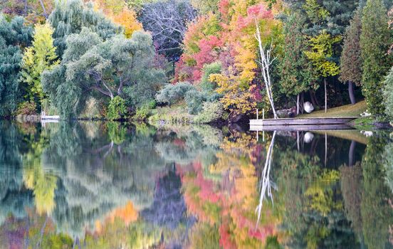 A cottage dock during the splendor of Autumn.