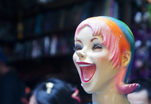 happy mannequin head with a big smile